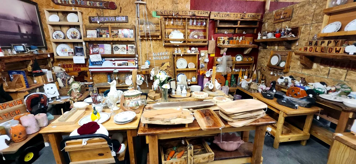 A vendor booth filled with unique finds at Country Pickins